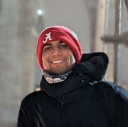viprav bundled up in a jacket and a beanie for the cold weather 