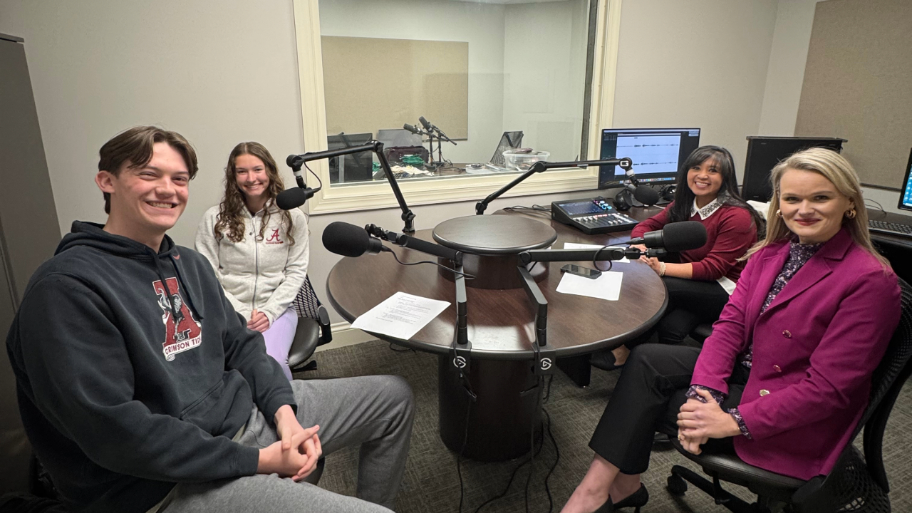 Students and staff sit down to record a session of Fit2BTide