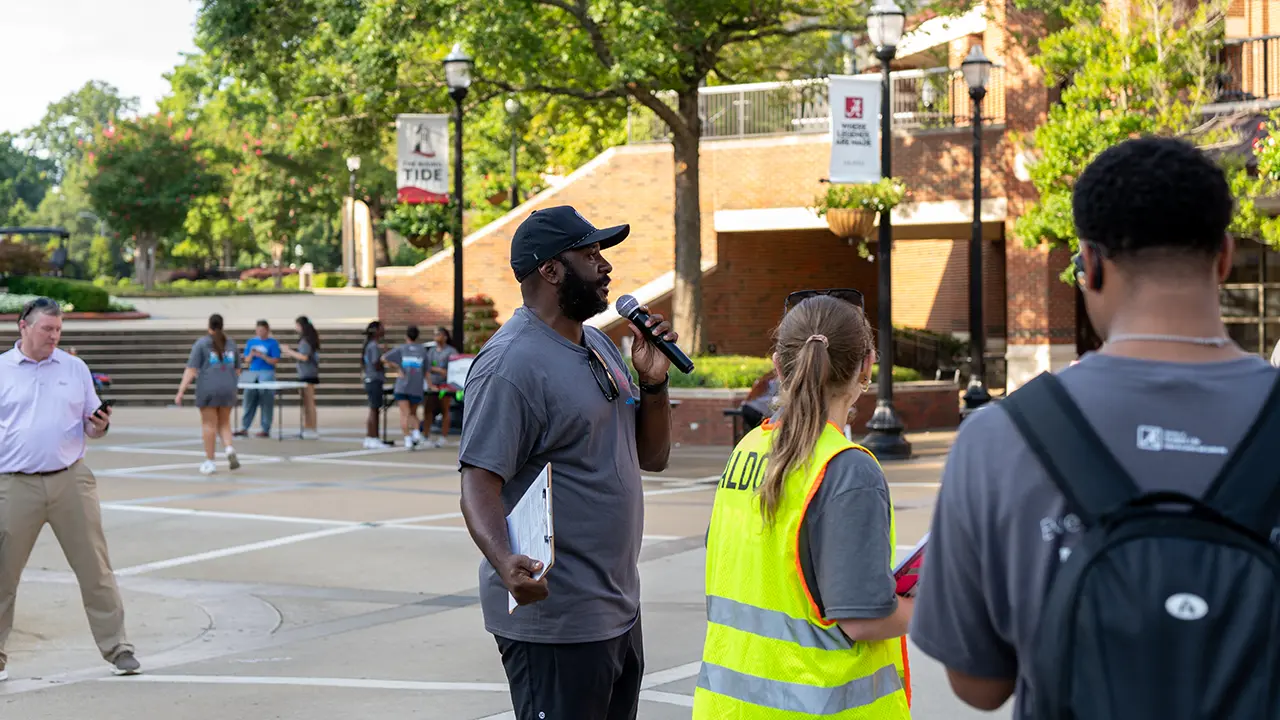 Sadaris Williams speaking during a service event at the UA Student Center